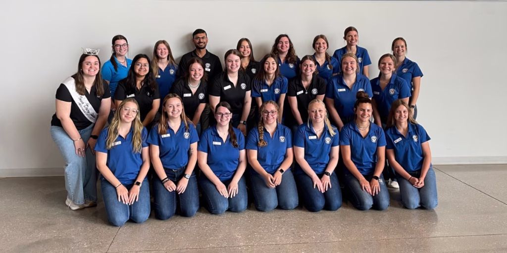 2025 Midwest Dairy interns, Ambassadors, and Princesses gather at an in-person event.
