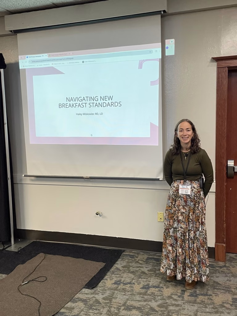 Midwest Dairy Wellness Warrior Haley speaking at event