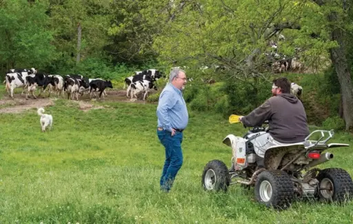 Jack Dill Talking with Farm Employee