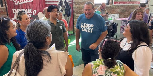 Dairy farmer engaging with thought leaders at Illinois State Fair