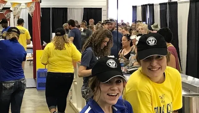 People gather at a dairy promotion event in South Dakota.