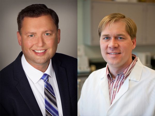 Former Midwest Dairy CEO Lucas Lentsch, left; Dr. Lloyd Metzger of the Midwest Dairy Foods Research Center, right.