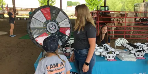 Dairy ambassador answering questions.