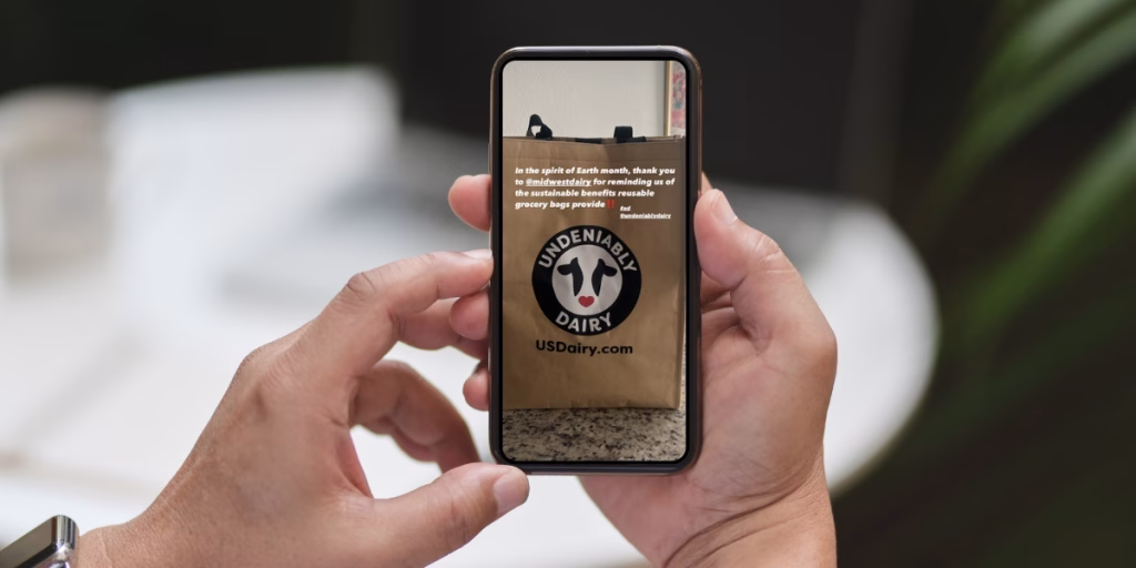 Hands holding cellphone featuring a TikTok video
