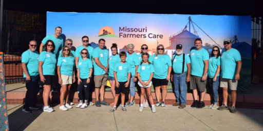 Group of farmers and staff at Cardinals game for Missouri Farmers Care