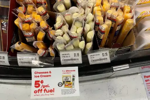 Photo of cheese sticks and sale sticker