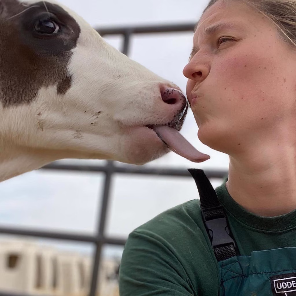 Dr. Lindsey Borst with Holstein calf.