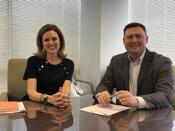 Former Midwest Dairy CEO Lucas Lentsch with Julie Yurko, CEO of the Northern Illinois Food Bank.