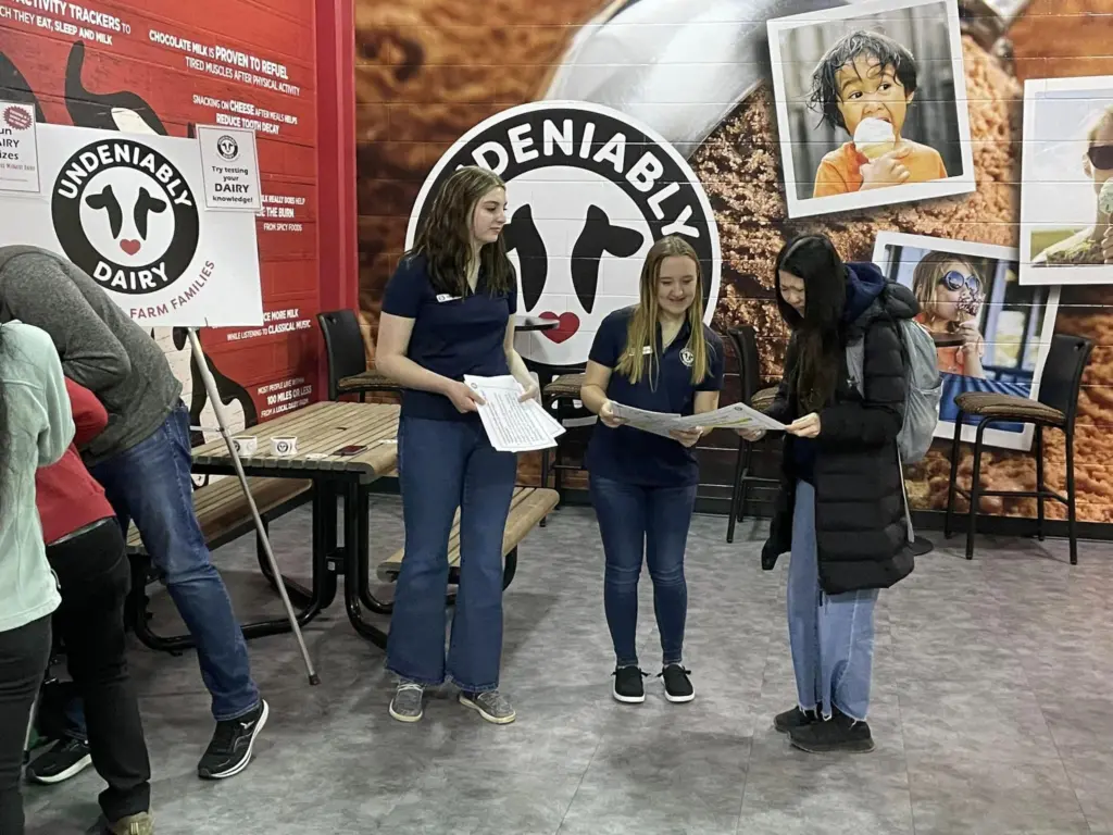 Nebraska 2023 Dairy Ambassadors engaging at event