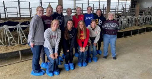 IGHSA Students in dairy barn.