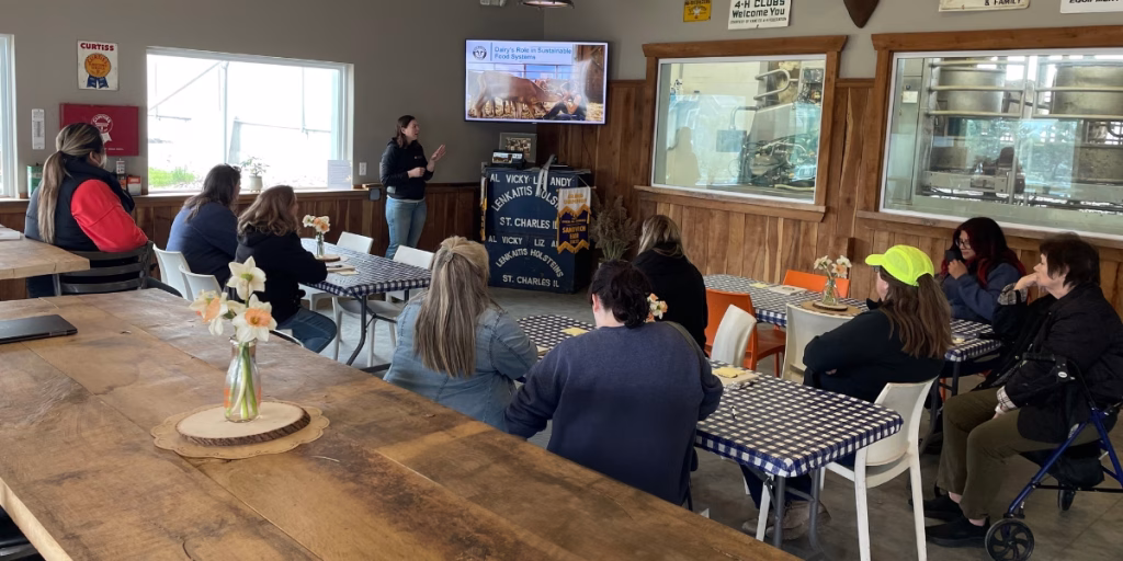 Group of educators listening to farmer presentation