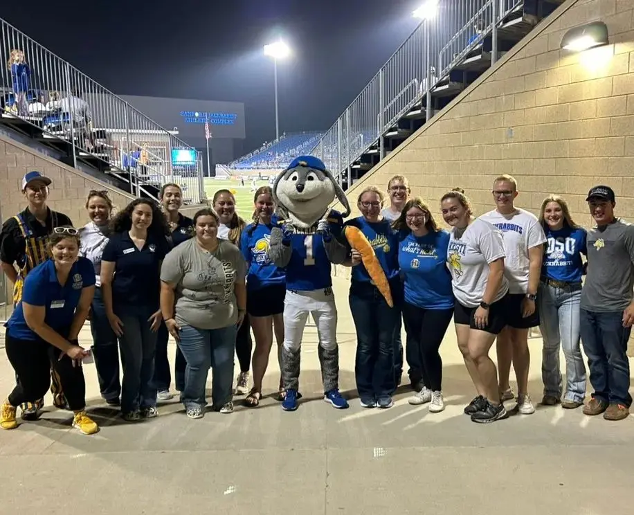 Group of South Dakota Dairy Ambassadors at football event