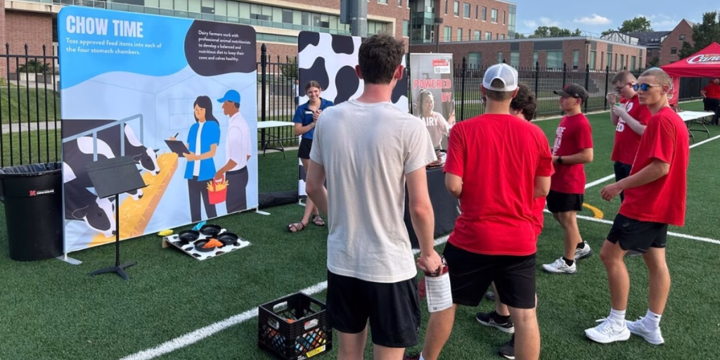 students at UNL welcome event playing dairy games