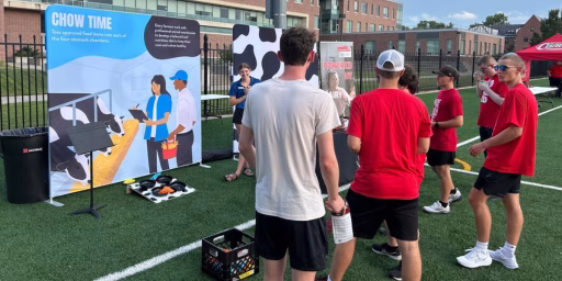 students at UNL welcome event playing dairy games