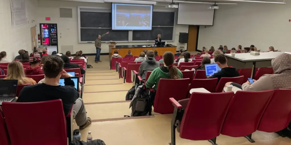 Dairy farmers speaking at college class