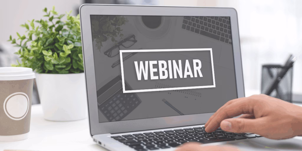The word 'webinar' on a computer screen