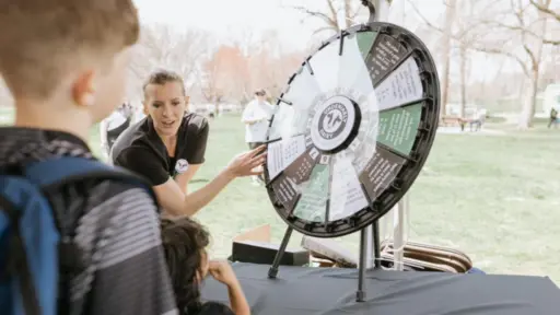 Young woman spinning undeniability diary spinner.